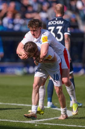 22 03 2026, Soccer, 2 Bundesliga, Matchday 27, VfL Bochum 1848 Holstein Kiel v l Jonas Therkelsen Holstein Kiel , Phil Harres Holstein Kiel celebrate the goal to 2 3 Bochum Vonovia Ruhrstadion NRW Germany xRHR PHOTO DEx Copyright: DennisxEwert RHR-FOTOx RHR-FOTO DE