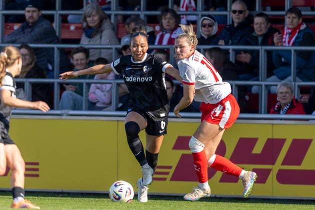 GER, Leipzig, Soccer, Google Pixel Women Bundesliga, 21 Matchday, RB Leipzig vs SC Freiburg in the picture from l Nicole Ojukwu SC Freiburg 06 , Marleen Schimmer RB Leipzig 14 , duel, 22 03 2025, RB Leipzig Training Academy Cottaweg Leipzig DFB REGULATIONS PROHIBIT ANY USE OF PHOTOGRAPHS AS IMAGE SEQUENCES AND OR QUASI VIDEO, Copyright: HMBxMedia PaulxFritz