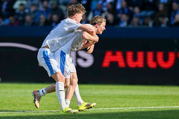 Jonas Therkelsen Kiel 10 celebrates after scoring 2 3 with Phil Harres Kiel 19 20 02 2026 ¢ Football ¢ VfL Bochum vs Holstein Kiel , Vonovia Ruhrstadion, Bochum, DFB DFL REGULATIONS PROHIBIT ANY USE OF PHOTOGRAPHS AS IMAGE SEQUENCES AND OR QUASI VIDEO Copyright: xpepphotox xHorstxMauelshagenx pep00321, pep_20260322_hm_315354