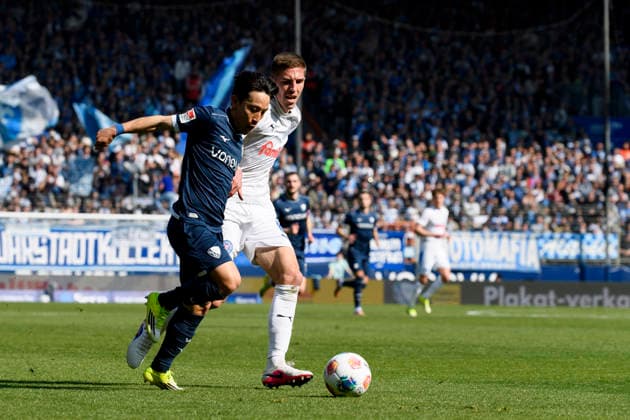 Koji Miyoshi VfL Bochum and David Zec Holstein Kiel battle for the ball during the 2 Bundesliga match between VfL Bochum and Holstein Kiel, Vonovia Ruhrstadion on March 22, 2026 in Bochum, Germany, Germany Photo by Max Maiwald DeFodi Images Koji Miyoshi VfL Bochum and David Zec Holstein Kiel battle for the ball during the 2 Bundesliga match between VfL Bochum and Holstein Kiel at Vonovia Ruhrstadion on March 22, 2026 in Bochum, Germany Photo by Max Maiwald DeFodi Images Photo by Max Maiwald DeFodi Images