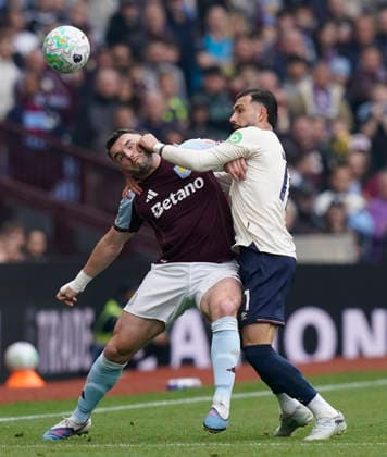 Birmingham, England, 22nd March 2026. Valentin Castellanos of West Ham United (R) challenges John McGinn of Aston Villa during the Aston Villa vs West Ham United Premier League match at Villa Park, Birmingham. Picture credit should read: Andrew Yates Sportimage EDITORIAL USE ONLY. No use with unauthorised audio, video, data, fixture lists, club league logos or live services. Online in-match use limited to 120 images, no video emulation. No use in betting, games or single club league player publications. SPI_016_AY_VILLA_WEST_HAM SPI-4635-0016
