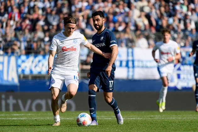 Niklas Niehoff Holstein Kiel and Gerrit Holtmann VfL Bochum battle for the ball during the 2 Bundesliga match between VfL Bochum and Holstein Kiel, Vonovia Ruhrstadion on March 22, 2026 in Bochum, Germany Photo by Max Maiwald DeFodi Images Niklas Niehoff Holstein Kiel and Gerrit Holtmann VfL Bochum battle for the ball during the 2 Bundesliga match between VfL Bochum and Holstein Kiel at Vonovia Ruhrstadion on March 22, 2026 in Bochum, Germany Photo by Max Maiwald DeFodi Images Photo by Max Maiwald DeFodi Images