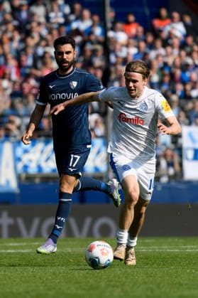 Niklas Niehoff Holstein Kiel and Gerrit Holtmann VfL Bochum battle for the ball during the 2 Bundesliga match between VfL Bochum and Holstein Kiel, Vonovia Ruhrstadion on March 22, 2026 in Bochum, Germany Photo by Max Maiwald DeFodi Images Niklas Niehoff Holstein Kiel and Gerrit Holtmann VfL Bochum battle for the ball during the 2 Bundesliga match between VfL Bochum and Holstein Kiel at Vonovia Ruhrstadion on March 22, 2026 in Bochum, Germany Photo by Max Maiwald DeFodi Images Photo by Max Maiwald DeFodi Images