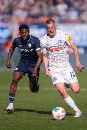 22 03 2026, Soccer, 2 Bundesliga, Matchday 27, VfL Bochum 1848 Holstein Kiel v l Ivan Nekic Holstein Kiel in duel with Moritz Broni Kwarteng VfL Bochum 1848 Bochum Vonovia Ruhrstadion NRW Germany xRHR PHOTO DEx Copyright: DennisxEwert RHR-FOTOx RHR-FOTO DE