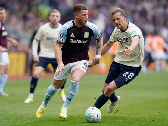 Birmingham, England, 22nd March 2026. Ross Barkley of Aston Villa (L) is challenged by Tomas Soucek of West Ham United during the Aston Villa vs West Ham United Premier League match at Villa Park, Birmingham. Picture credit should read: Andrew Yates Sportimage EDITORIAL USE ONLY. No use with unauthorised audio, video, data, fixture lists, club league logos or live services. Online in-match use limited to 120 images, no video emulation. No use in betting, games or single club league player publications. SPI_023_AY_VILLA_WEST_HAM SPI-4635-0023
