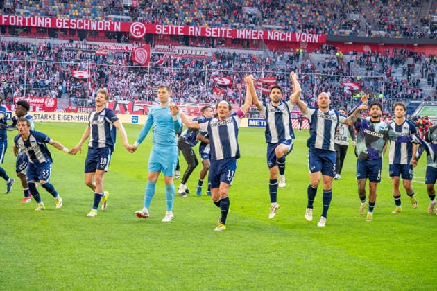 Germany 2 Bundesliga 2025 26 Fortuna Düsseldorf vs Hertha BSC, Matchday 27 22 03 2026 MERKUR SPIEL ARENA Düsseldorf cheers after the win Fabian Reese Hertha BSC,11 Tjark Ernst Hertha BSC,1 Luca Schuler Hertha BSC,18 Copyright: xOrhanxHabashx