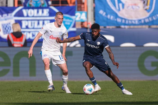 22 03 2026, Soccer, 2 Bundesliga, Matchday 27, VfL Bochum 1848 Holstein Kiel v l Ivan Nekic Holstein Kiel , Moritz Broni Kwarteng VfL Bochum 1848 Bochum Vonovia Ruhrstadion NRW Germany xRHR PHOTO DEx Copyright: DennisxEwert RHR-FOTOx RHR-FOTO DE