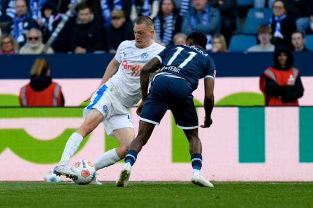 Moritz Broni Kwarteng VfL Bochum and Ivan Nekic Holstein Kiel battle for the ball during the 2 Bundesliga match between VfL Bochum and Holstein Kiel, Vonovia Ruhrstadion on March 22, 2026 in Bochum, Germany, Germany Photo by Max Maiwald DeFodi Images Moritz Broni Kwarteng VfL Bochum and Ivan Nekic Holstein Kiel battle for the ball during the 2 Bundesliga match between VfL Bochum and Holstein Kiel at Vonovia Ruhrstadion on March 22, 2026 in Bochum, Germany Photo by Max Maiwald DeFodi Images Photo by Max Maiwald DeFodi Images