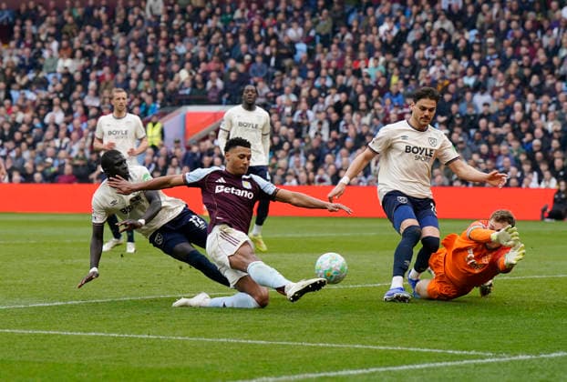 Birmingham, England, 22nd March 2026. Ollie Watkins of Aston Villa (C) scores the second goal during the Aston Villa vs West Ham United Premier League match at Villa Park, Birmingham. Picture credit should read: Andrew Yates Sportimage EDITORIAL USE ONLY. No use with unauthorised audio, video, data, fixture lists, club league logos or live services. Online in-match use limited to 120 images, no video emulation. No use in betting, games or single club league player publications. SPI_026_AY_VILLA_WEST_HAM SPI-4635-0026