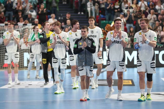 22 03 2026, xgox, Handball, European Championship Qualification, Germany Egypt emspor v l Tim Freihoefer Germany, 2 , Renars Uscins Germany, 23 , Franz Semper Germany, 32 Celebrating the victory, cheering after the end of the game Bremen