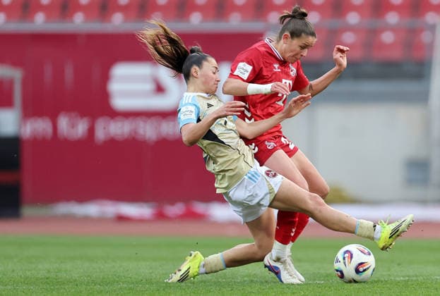 Seguin Maelle - Feiersinger Laura , 1.FC Nürnberg-1.FC Köln Frauen , Frauen Bundesliga , Fußball , in den Max Morlock Stadion, in Nürnberg , Bayern , Deutschland. März 22 , 2026 . Photo by: Davide Elias IPA Photo Pressefoto DENL Copyright: xDavidexEliasx