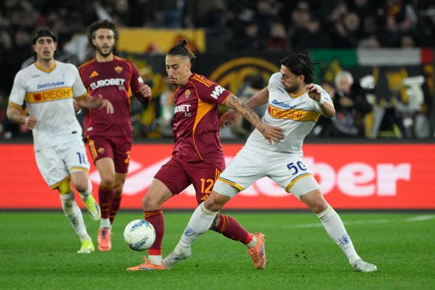 Romaâ??s Kostas Tsimikas and Lecceâ??s Santiago Pierotti during the Italian Football Championship League A Enilive 2025 2026 match between AS Roma vs US Lecce at the Olimpic Stadium in Rome on 22 March 2026.  Copyright: xFabrizioxCorradetti IPAxSportx xipa-agency.netx xx IPA_73299757 IPA_Agency_IPA73299757
