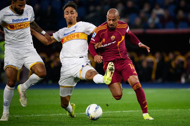Jamil Siebert and Tiago Gabriel of US Lecce and Donyell Malen of AS Roma compete for the ball during the Serie A 2025 2026 football match between AS Roma and US Lecce at Stadio Olimpico in Rome (Italy), March 22, 2026. AndreaxStaccioli
