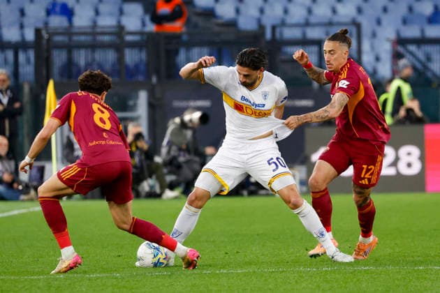 March 22, 2026, Rome, ITALY: (L-R) AS Roma s Neil El Aynaoui, Lecce™s Santiago Pierotti, AS Roma s Konstantinos Tsimikas during the Italian Serie A soccer match between AS Roma and US Lecce at the Olimpico stadium in Rome, Italy 22 March 2026. ANSA FABIO FRUSTACI. Serie A: Roma Vs Lecce  - ZUMAa110 20260322_zaf_a110_098 Copyright: xFabioxFrustacix