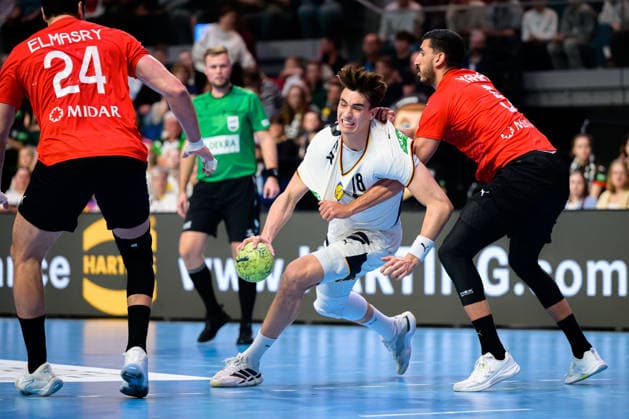 Bremen Handball international match Germany Egypt v li in duel Julian Köster Koester Germany and Yehia Khaled Egypt Bremen ÖVB Arena Germany