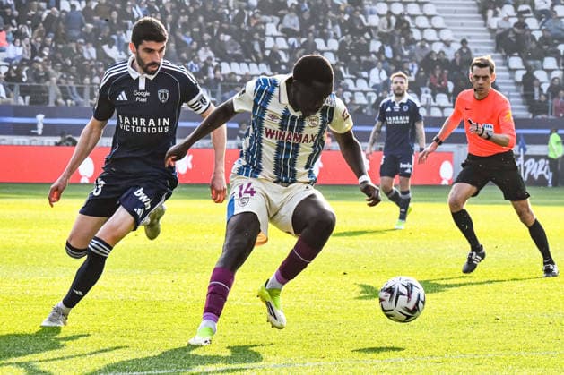 FOOTBALL : Paris FC vs Le Havre AC - Ligue 1 - JournÃ e 27 - 22 03 2026 Rassoul Ndiaye (AC Le Havre) Pierre Lees-Melou (Paris FC) ParisFrance  Copyright: xBaptistexAutissierx