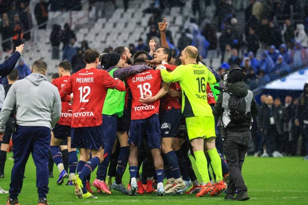 France - Ligue 1 McDonald - Olympique de Marseille vs Lille OSC - 22 03 2026 FRANCE, MARSEILLE, MARCH 22. Players of Lille celebrate victory at the end of Ligue 1 McDonald football match between Olympique de Marseille and Lille OSC on March 22, 2026 at Stade Velodrome in Marseille, France. Photo by Manuel Blondeau AOP.Press Marseille Stade Velodrome Provence France Copyright: x ManuelxBlondeau AOP.Pressx AOP20260322-0007