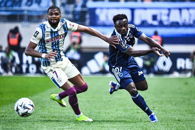 FOOTBALL : Paris FC vs Le Havre AC - Ligue 1 - JournÃ e 27 - 22 03 2026 Moses Simon (Paris FC) LoÃ¯c Nego (AC Le Havre) ParisFrance  Copyright: xBaptistexAutissierx