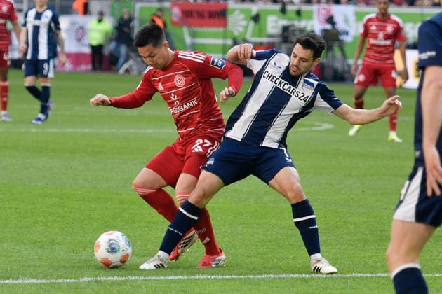 v li in duel Shinta Appelkamp Duesseldorf 23 Josip Brekalo BSC 7 22 03 2026 ¢ Soccer ¢ Fortuna Duesseldorf vs Hertha BSC, Merkur Spiel Arena, Duesseldorf, DFB DFL REGULATIONS PROHIBIT ANY USE OF PHOTOGRAPHS AS IMAGE SEQUENCES AND OR QUASI VIDE Copyright: xpepphotox xSaschaxWeizx pep00321, pep_20260322_hm_317158