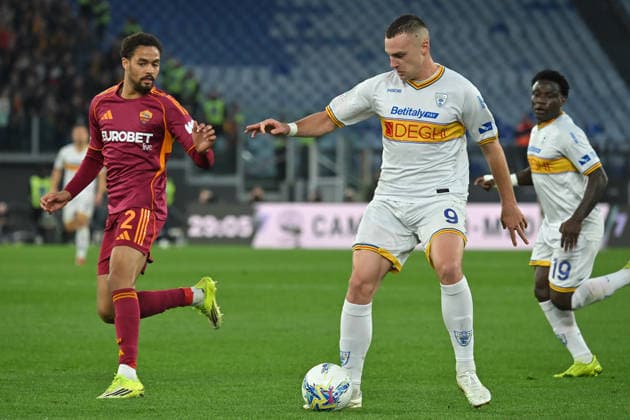 Soccer, serie A match, AS Roma v Lecce Devyne Rensch of AS Roma,Nikola Stulic of Lecce during the serie A Enilive match between AS Roma v Lecce at olimpico stadium in Rome, Italy, Mar 22nd, 2026 Imago-Images Emmefoto Copyright: xImago-Images Emmefotox