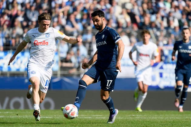 Niklas Niehoff Holstein Kiel and Gerrit Holtmann VfL Bochum battle for the ball during the 2 Bundesliga match between VfL Bochum and Holstein Kiel, Vonovia Ruhrstadion on March 22, 2026 in Bochum, Germany Photo by Max Maiwald DeFodi Images Niklas Niehoff Holstein Kiel and Gerrit Holtmann VfL Bochum battle for the ball during the 2 Bundesliga match between VfL Bochum and Holstein Kiel at Vonovia Ruhrstadion on March 22, 2026 in Bochum, Germany Photo by Max Maiwald DeFodi Images Photo by Max Maiwald DeFodi Images