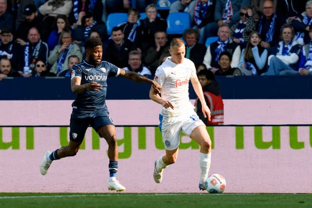 Moritz Broni Kwarteng VfL Bochum and Ivan Nekic Holstein Kiel battle for the ball during the 2 Bundesliga match between VfL Bochum and Holstein Kiel, Vonovia Ruhrstadion on March 22, 2026 in Bochum, Germany, Germany Photo by Max Maiwald DeFodi Images Moritz Broni Kwarteng VfL Bochum and Ivan Nekic Holstein Kiel battle for the ball during the 2 Bundesliga match between VfL Bochum and Holstein Kiel at Vonovia Ruhrstadion on March 22, 2026 in Bochum, Germany Photo by Max Maiwald DeFodi Images Photo by Max Maiwald DeFodi Images