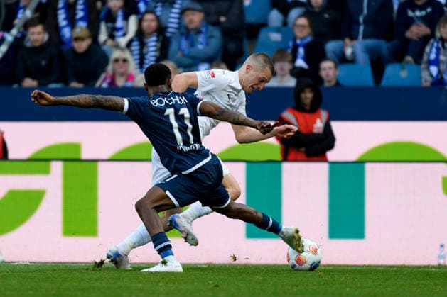 Moritz Broni Kwarteng VfL Bochum and Ivan Nekic Holstein Kiel battle for the ball during the 2 Bundesliga match between VfL Bochum and Holstein Kiel, Vonovia Ruhrstadion on March 22, 2026 in Bochum, Germany, Germany Photo by Max Maiwald DeFodi Images Moritz Broni Kwarteng VfL Bochum and Ivan Nekic Holstein Kiel battle for the ball during the 2 Bundesliga match between VfL Bochum and Holstein Kiel at Vonovia Ruhrstadion on March 22, 2026 in Bochum, Germany Photo by Max Maiwald DeFodi Images Photo by Max Maiwald DeFodi Images