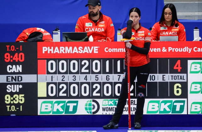 March 22, 2026, Calgary, Ab, CANADA: Team Canada skip Kerri Einarson, centre, watches Switzerland play at the World Women™s Curling Championship in Calgary, Sunday, March 22, 2026. Kerri Einarson  - ZUMAc35_ 20260322_zaf_c35_026 Copyright: xJeffxMcintoshx
