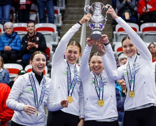 March 22, 2026, Calgary, Ab, CANADA: Switzerland skip Xenia Schwaller, left to right, third Selina Gafner, vice-skip Fabienne Rieder and lead Selina Rychiger raise the trophy after defeating Canada to win the World WomenöÄÃ s Curling Championship in Calgary, Sunday, March 22, 2026. Selina Rychiger, Fabienne Rieder, Selina Gafner, Xenia Schwaller  - ZUMAc35_ 20260322_zaf_c35_039 Copyright: xJeffxMcintoshx