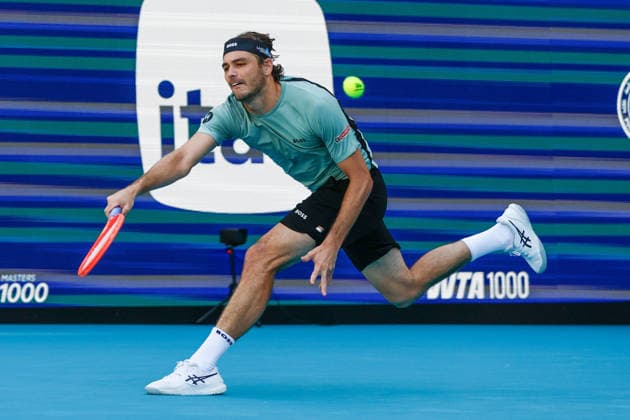 MIAMI GARDENS, FL - MARCH 22: Taylor Fritz (USA) in action during his men™s third round singles match against Reilly Opelka (USA) at the Miami Open on March 22, 2026, at Hard Rock Stadium in Miami Gardens, Florida,(Photo by Chris Arjoon Icon Sportswire) TENNIS: MAR 22 Miami Open EDITORIAL USE ONLY Icon2603220010034