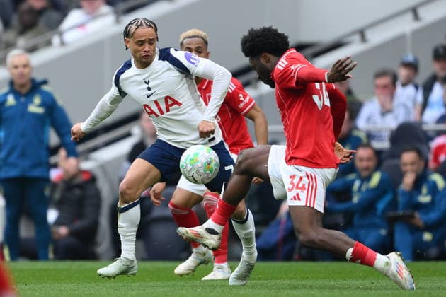 Tottenham Hotspur v Nottingham Forest - Premier League Ola Aina of Nottingham Forest is under pressure from Xavi Simons of Tottenham Hotspur during the Premier League match between Tottenham Hotspur and Nottingham Forest at the Tottenham Hotspur Stadium in London on March 22, 2026. London Greater London United Kingdom  Copyright: xMIxNewsx originalFilename:fletcher-tottenha260322_npwBm.jpg