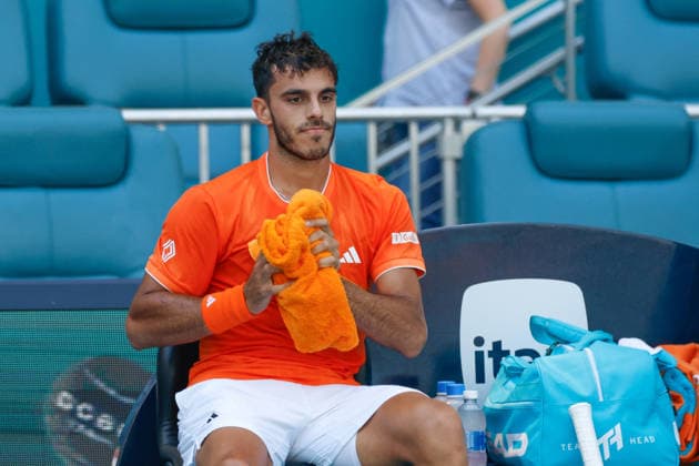 MIAMI GARDENS, FL - MARCH 23: Francisco Cerundolo (ARG) looks on at a break during a men™s third round singles match against Daniil Medvedev at the Miami Open on March 23, 2026, at Hard Rock Stadium in Miami Gardens, Florida,(Photo by Chris Arjoon Icon Sportswire) TENNIS: MAR 23 Miami Open EDITORIAL USE ONLY Icon2603230010030