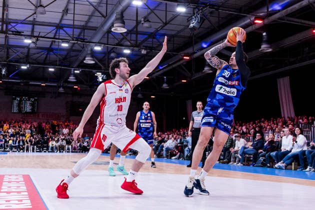 Barmer 2 Basketball Bundesliga ProA RheinStars Cologne vs Phoenix Hagen, 23 03 2026 Haris Hujic RheinStars Cologne, 10 , Jeffrey Carroll Phoenix Hagen, 30 in the throw Barmer 2 Basketball Bundesliga ProA RheinStars Cologne vs Phoenix Hagen, Cologne, Motorworld on 23 03 2026 Copyright: xBEAUTIFULxSPORTS Wunderlx