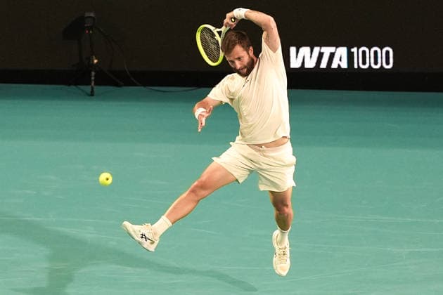 March 23, 2026, Miami Gardens, Florida, USA: Corentin Moutet (FRA) returns a shot to Jannick Sinner (not pictured) during the men s third round singles match at the 2026 Miami Open presented by Itau at Hard Rock Stadium. Miami Gardens USA - ZUMAw109 20260323_fap_w109_052 Copyright: xDebbyxWongx