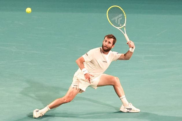March 23, 2026, Miami Gardens, Florida, USA: Corentin Moutet (FRA) returns a shot to Jannick Sinner (not pictured) during the men s third round singles match at the 2026 Miami Open presented by Itau at Hard Rock Stadium. TENNIS 2026: Miami Open.  - ZUMAw109 20260323_fap_w109_057 Copyright: xDebbyxWongx