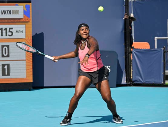 MIAMI GARDENS, FL - MARCH 23: Hailey Baptiste of the United States returns a shot to Jelena Ostapenko of Latvia on Day 7 of the Miami Open Presented by Itau at Hard Rock Stadium on March 23, 2026 in Miami Gardens, Florida. (Photo by Michele Eve Sandberg Icon Sportswire) TENNIS: MAR 23 Miami Open EDITORIAL USE ONLY Icon26032320