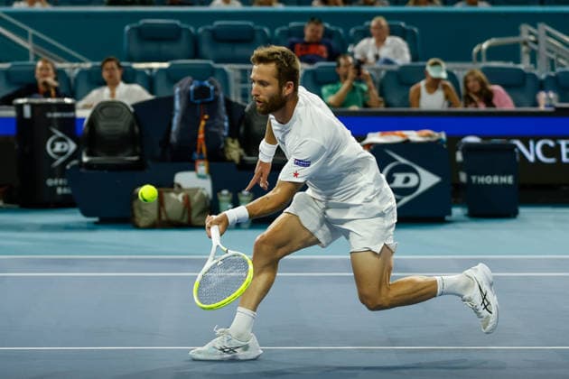 MIAMI GARDENS, FL - MARCH 23: Corentin Moutet (FRA) in action during a men™s third round singles match against Jannik Sinner (ITA) at the Miami Open on March 23, 2026, at Hard Rock Stadium in Miami Gardens, Florida,(Photo by Chris Arjoon Icon Sportswire) TENNIS: MAR 23 Miami Open EDITORIAL USE ONLY Icon2603230010134