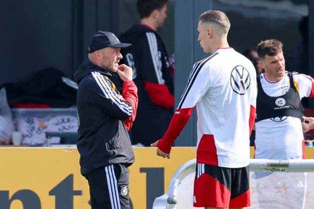 Assistant coach Alfred Schreuder Germany and Nico Schlotterbeck Germany talk together, , Training of the German national soccer team, Home Ground on March 24, 2026 in Herzogenaurach, Germany Photo by Marco Steinbrenner DeFodi Images Assistant coach Alfred Schreuder Germany and Nico Schlotterbeck Germany talk together, , Training of the German national soccer team, Home Ground, March 24, 2026 in Herzogenaurach, Germany Photo by Marco Steinbrenner DeFodi Images