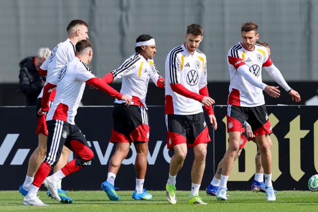 Florian Wirtz Germany , Nico Schlotterbeck Germany , Serge Gnabry Germany , Anton Stach Germany and Leon Goretzka Germany warm up, , Training of the German national soccer team, Home Ground on March 24, 2026 in Herzogenaurach, Germany Photo by Marco Steinbrenner DeFodi Images Florian Wirtz Germany , Nico Schlotterbeck Germany , Serge Gnabry Germany , Anton Stach Germany and Leon Goretzka Germany warm up, , Training of the German national soccer team, Home Ground, March 24, 2026 in Herzogenaurach, Germany Photo by Marco Steinbrenner DeFodi Images