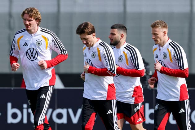 Nick Woltemade Germany , Angelo Stiller Germany , Deniz Undav Germany and Chris Fuehrich Germany warm up, , German national football team training, Home Ground on March 24, 2026 in Herzogenaurach, Germany Photo by Marco Steinbrenner DeFodi Images Nick Woltemade Germany , Angelo Stiller Germany , Deniz Undav Germany and Chris Fuehrich Germany warm up, , German national football team training, Home Ground, March 24, 2026 in Herzogenaurach, Germany Photo by Marco Steinbrenner DeFodi Images
