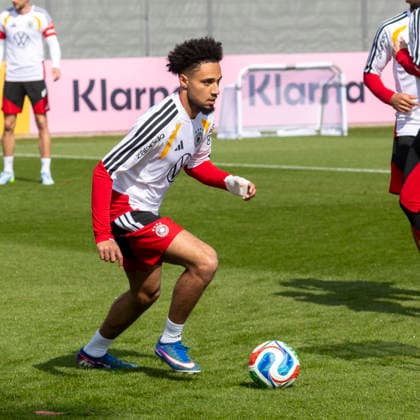Report 24 03 2026 First training session for the mens national soccer team at adidas in Herzogenaurach ahead of the international matches against Switzerland and Ghana Kevin Schade on the ball Herzogenaurach Bavaria Germany