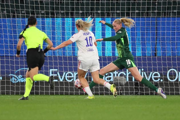 VfL vs Lyon, CL Women, Wolfsburg, 24 03 2026, Football, Women, VfL Wolfsburg vs Olympique Lyon, Champions League, Quarterfinals, Season 2025 2026, Linsdey Heaps Lyon , Camilla Küver VfL Wolfsburg AOK Stadion Niedersachsen Germany