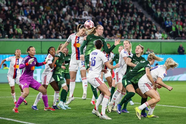 Camilla Küver VfL Wolfsburg,16 vs Damaris Egurrola OL Lyonnes Lyon,13 Womens Champions League quarter-final season 2025 2026 VfL Wolfsburg vs OL Lyonnes Lyon at the Volkswagen Arena in Wolfsburg Action,soccer,woman,women,ladies,Germany,24 03 2026