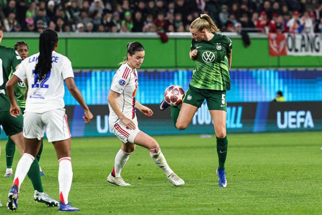 Ella Peddemors VfL Wolfsburg,5 vs Damaris Egurrola OL Lyonnes Lyon,13 Womens Champions League quarter-final season 2025 2026 VfL Wolfsburg vs OL Lyonnes Lyon at the Volkswagen Arena in Wolfsburg Action,soccer,woman,women,women,Germany,24 03 2026