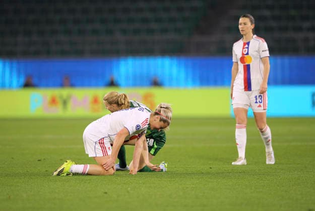 Photo Lindsey HEAPS Lyon goes down against Justine KIELLAND Wolfsburg Football Womens Champions League on Tue 24 03 2026 Quarterfinal VfL Wolfsburg Olympique Lyon