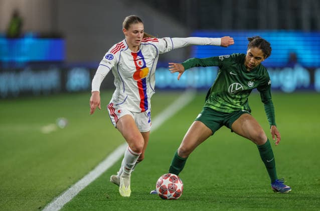 GER, Wolfsburg, VfL Wolfsburg vs Olympique Lyon, WomenÂs Champions League, Football, UEFA, Season 2025 2026, AOK Arena, Quarter-final, First leg in picture f l Jule Brand Olympique Lyon Women 29 , Cora Zicai VfL Wolfsburg Women 28 , Duel DFB DFL REGULATIONS PROHIBIT ANY USE OF PHOTOGRAPHS AS IMAGE SEQUENCES AND OR QUASI VIDEO, 24 03 2026 Copyright: HMBxMedia HendrikxHamelau