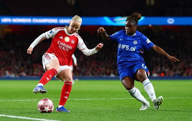 Beth Mead of Arsenal and Sandy Baltimore of Chelsea. Arsenal Women v Chelsea Women, UEFA Women s Champions League, Quarter Final, First Leg, Football, Emirates Stadium, London, UK - 24 Mar 2026London Emirates Stadium United Kingdom EDITORIAL USE ONLY No use with unauthorised audio, video, data, fixture lists, club league logos or live services. Online in-match use limited to 120 images, no video emulation. No use in betting, games or single club league player publications.  Copyright: xJamesxMarsh Shutterstockx 16787096v