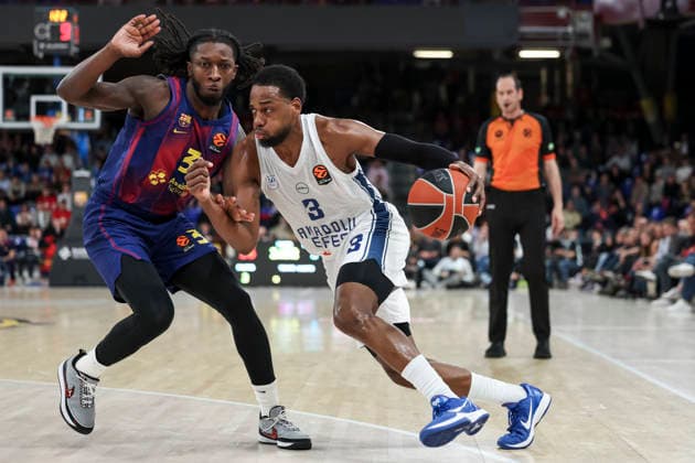 March 24, 2026, Barcelona, Barcelona, Spain: Jordan Loyd of Anadolu Efes Istanbul and Myles Cale of FC Barcelona, Barca in action during the EuroLeague Regular Season Round 33 match played between FC Barcelona and Anadolu Efes Istanbul at Palau Blaugrana on March 24, 2026 in Barcelona, Spain. Barcelona Spain - ZUMAa181 20260324_zaa_a181_120 Copyright: xJavierxBorregox