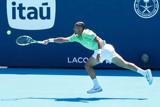 March 24, 2026, Miami Gardens, Florida, USA: Arthur Fils (FRA) returns a shot to Valentin Vacherot (not pictured) during the men s fourth round match at the 2026 Miami Open presented by Itau at Hard Rock Stadium. Miami Gardens USA - ZUMAw109 20260324_fap_w109_054 Copyright: xDebbyxWongx
