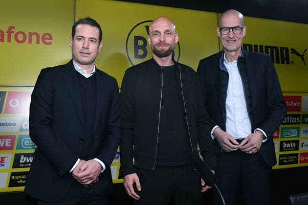Soccer 1 Bundesliga Presentation of Nils Ole Book at Borussia Dortmund on 25 03 2026 at Signal Iduna Park in Dortmund Lars Ricken Managing Director Sport Dortmund , left Nils Ole Book Sports Director Dortmund , center Carsten Kramer Spokesman of the Management Dortmund , right xRx